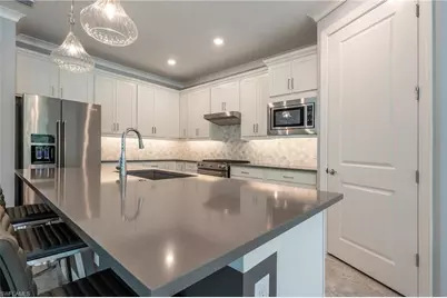 6902 Winding Cypress Dr, Naples, FL 34114 - Photo 9