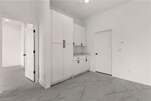 825 Frederick Reid St E, Lehigh Acres, FL 33971 - Photo 11