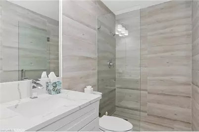 7048 Pelican Bay Blvd #C-105, Naples, FL 34108 - Photo 15