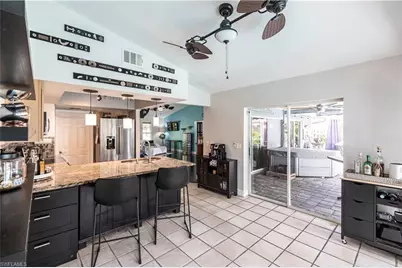 2667 River Reach Dr, Naples, FL 34104 - Photo 11