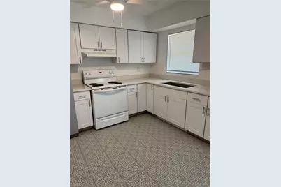 3325 Airport Pulling Rd N #E4, Naples, FL 34105 - Photo 1