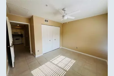 1275 Wildwood Lakes Blvd #202, Naples, FL 34104 - Photo 9