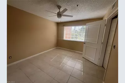 1275 Wildwood Lakes Blvd #202, Naples, FL 34104 - Photo 13