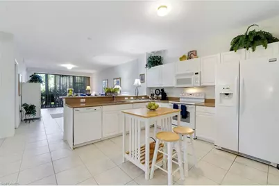 10049 Heather Ln #101, Naples, FL 34119 - Photo 11