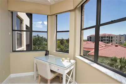 7040 Pelican Bay Blvd #D401, Naples, FL 34108 - Photo 11