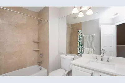 15587 Marcello Cir #144, Naples, FL 34110 - Photo 23