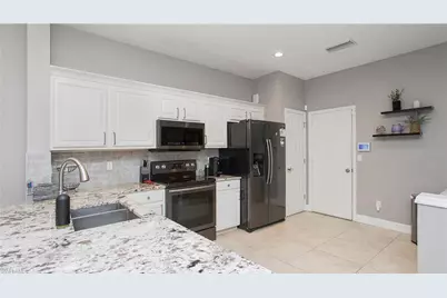 15587 Marcello Cir #144, Naples, FL 34110 - Photo 3