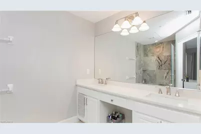 15587 Marcello Cir #144, Naples, FL 34110 - Photo 19