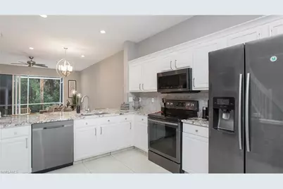 15587 Marcello Cir #144, Naples, FL 34110 - Photo 5