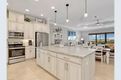 9685 Montelanico Loop SE #202, Naples, FL 34119 - Photo 1