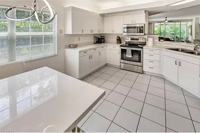 6910 Satinleaf Rd N #101, Naples, FL 34109 - Photo 9