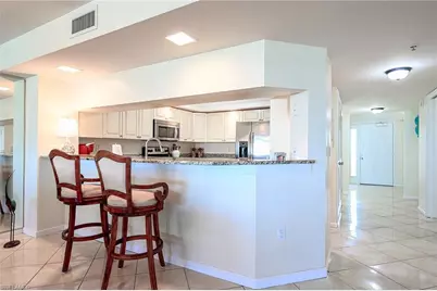 25 Bluebill Ave #403, Naples, FL 34108 - Photo 13