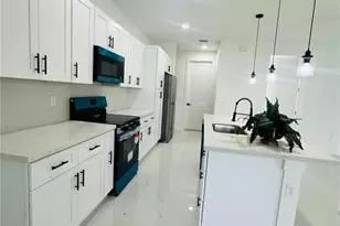 545 Trinity St E, Lehigh Acres, FL 33974 - Photo 5