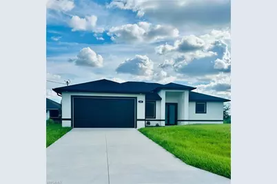 828 Portland St E, Lehigh Acres, FL 33974 - Photo 1