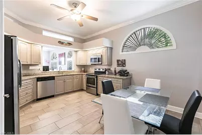 11384 Quail Village Way #202, Naples, FL 34119 - Photo 9