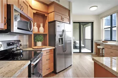 7008 Pelican Bay Blvd #H302, Naples, FL 34108 - Photo 11