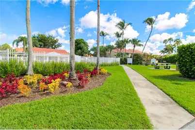 7794 Emerald Cir #A-102, Naples, FL 34109 - Photo 11