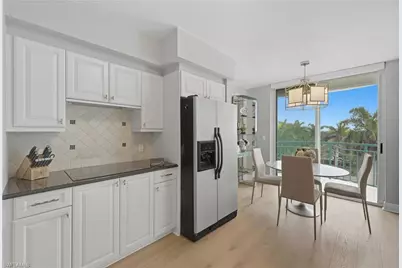 7515 Pelican Bay Blvd #5B, Naples, FL 34108 - Photo 15