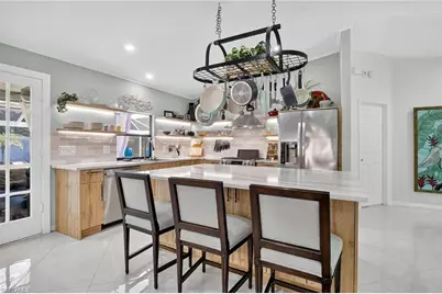 410 6th St NE, Naples, FL 34120 - Photo 11