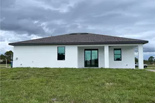 821 Newell St E, Lehigh Acres, FL 33974 - Photo 7