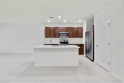 15535 Wildflower Cir, Naples, FL 34119 - Photo 3