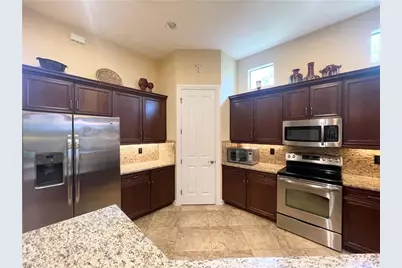 7302 Acorn Way, Naples, FL 34119 - Photo 13