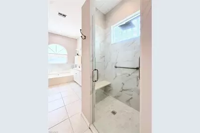 8744 Naples Heritage Dr #E28, Naples, FL 34112 - Photo 19