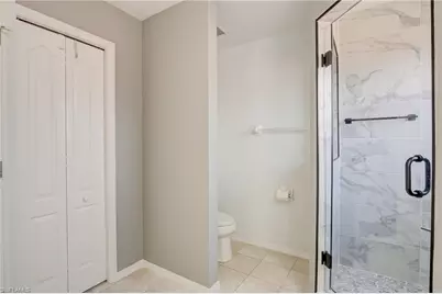 25680 Springtide Ct, Bonita Springs, FL 34135 - Photo 19