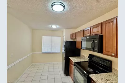 5665 Whitaker Rd #A-201, Naples, FL 34112 - Photo 11