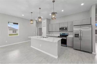 1311 NW Juanita Pl, Cape Coral, FL 33993 - Photo 7