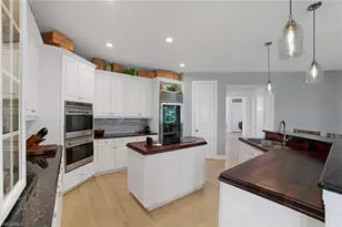 12901 Pond Apple Dr E, Naples, FL 34119 - Photo 9