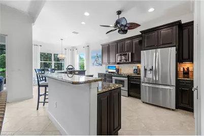 9090 Limestone Ln, Naples, FL 34120 - Photo 11