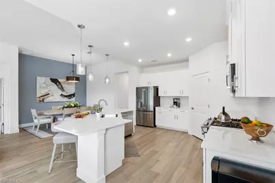 16889 Fairgrove Way #5-201, Naples, FL 34110 - Photo 9