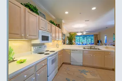 1015 Tarpon Cove Dr #1403, Naples, FL 34110 - Photo 13