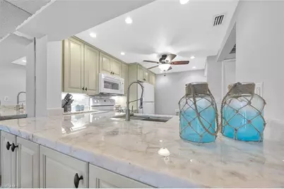 1083 Forest Lakes Dr #207, Naples, FL 34105 - Photo 1