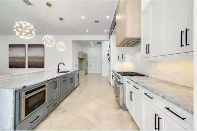 13087 Pond Apple Dr E, Naples, FL 34119 - Photo 17