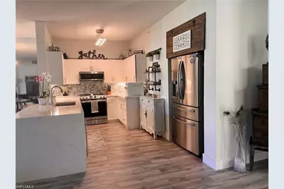 56 Silver Oaks Cir #102, Naples, FL 34119 - Photo 3