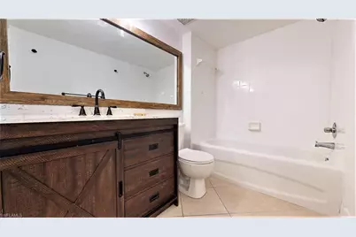 1210 Wildwood Lakes Blvd #306, Naples, FL 34104 - Photo 11