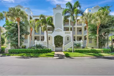 7654 Pebble Creek Cir #303, Naples, FL 34108 - Photo 1