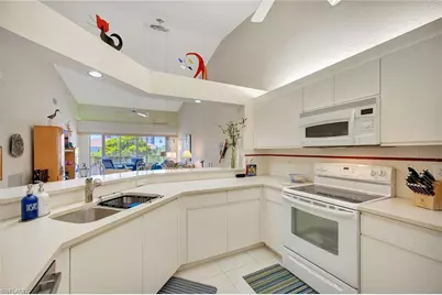 7654 Pebble Creek Cir #303, Naples, FL 34108 - Photo 17