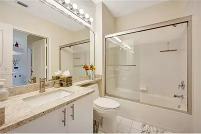 7654 Pebble Creek Cir #303, Naples, FL 34108 - Photo 25