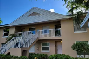 144 Pebble Shores Dr, Naples, FL 34110 - Photo 1