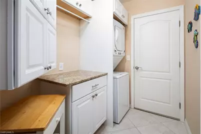 7048 Pelican Bay Blvd #C104, Naples, FL 34108 - Photo 15