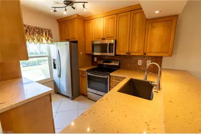 1015 Mainsail Dr #103, Naples, FL 34114 - Photo 11