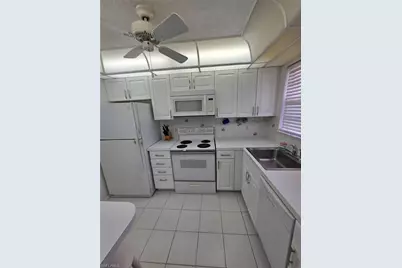 160 Turtle Lake Ct #209, Naples, FL 34105 - Photo 11