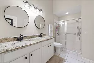 7715 Woodbrook Cir, Naples, FL 34104 - Photo 17