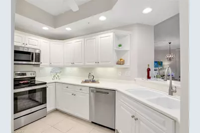 1001 Arbor Lake Dr #102, Naples, FL 34110 - Photo 5