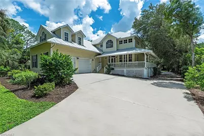 5070 Palmetto Woods Dr, Naples, FL 34119 - Photo 1
