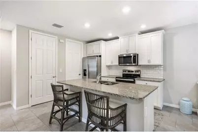 14551 Edgewater Cir, Naples, FL 34114 - Photo 9