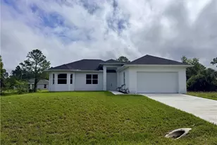 523 Harry Thayer Ave S, Lehigh Acres, FL 33974 - Photo 1
